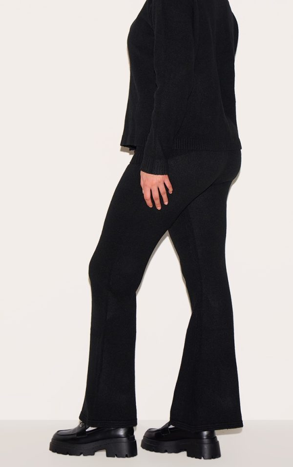 53040eff891a583c0e726e420bbba66ed0c04ca6_CNJ1990_3_plus_black_melange_soft_knit_foldover_waist_flared_trousers