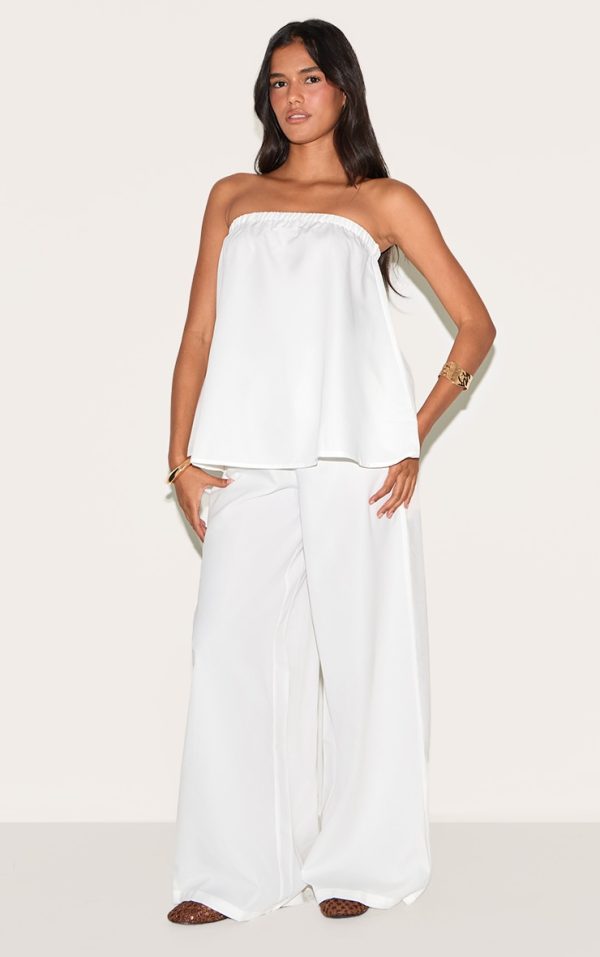 53a07648bcc1323ce02dfa8b17ca3b55d595f50b_CNM8915_1_cream_woven_mid_rise_wide_leg_trousers