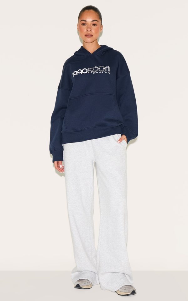 53cbe924536f71f3e47989b6c284080595063241_CNM0185_3_navy_sports_puff_print_oversize_hoodie