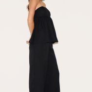 5470b763b4576bdad494d21af2bcf7959b2160b2_CNM0436_3_black_bandeau_peplum_detail_jumpsuit-1