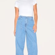562b8e20a4fa5af98478e8c5b5912ac36628882b_CNL7054_1_petite_mid_blue_wash_low_rise_tie_waistband_wide_leg_jeans