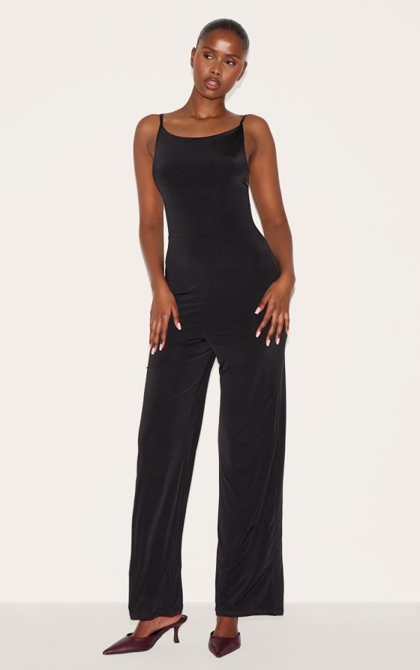 56584572fc6d6d2fdc6151eabb48bed236b0a50f_CNM3115_3_black_double_layer_slinky_low_back_strappy_wide_leg_jumpsuit-1