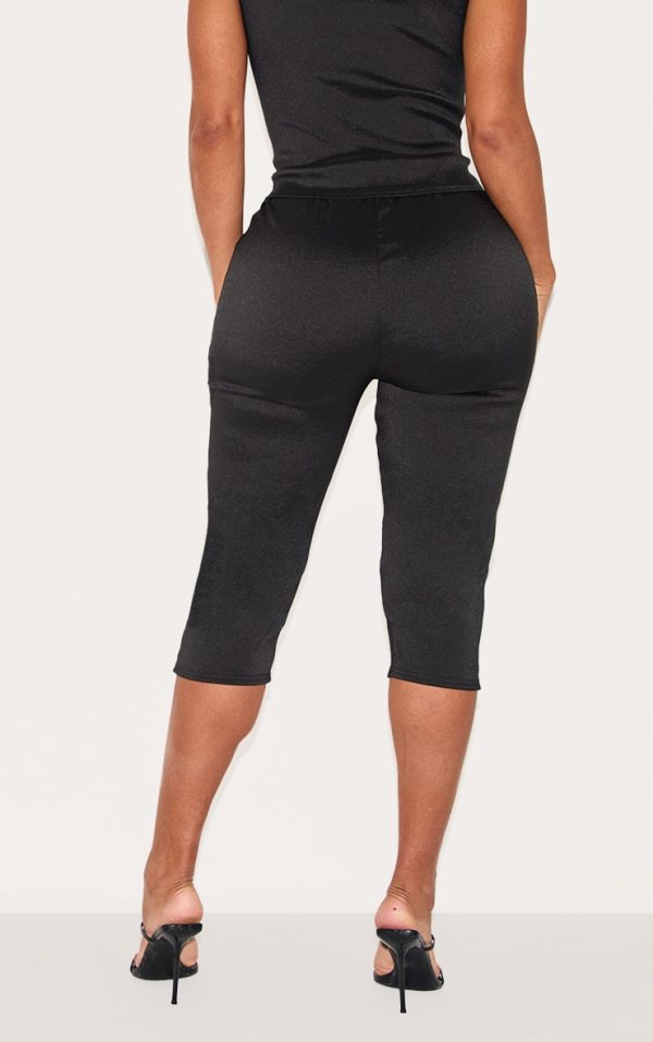 56dffa10f20e67fa6ea15fb7b8a0ea894cb858e9_CNM2077_3_shape_black_stretch_woven_pintuck_capri_pants