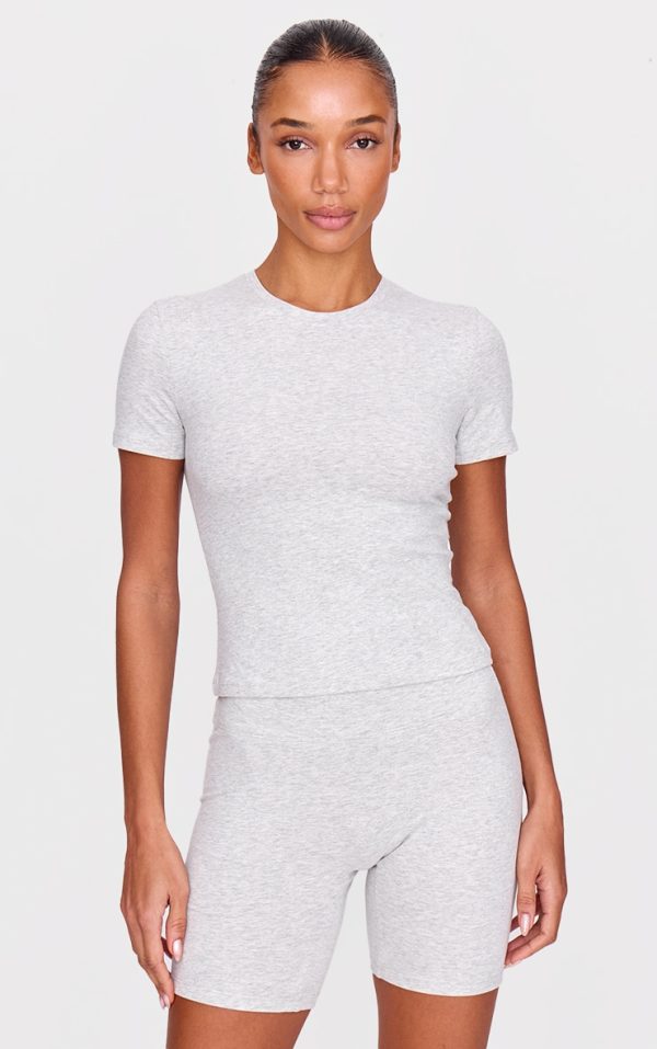 56eee555b13f732f7cef83a65e7559d70302ea4e_CNJ3133_1_ash_grey_marl_ultimate_sculpt_longline_short_sleeve_gym_top