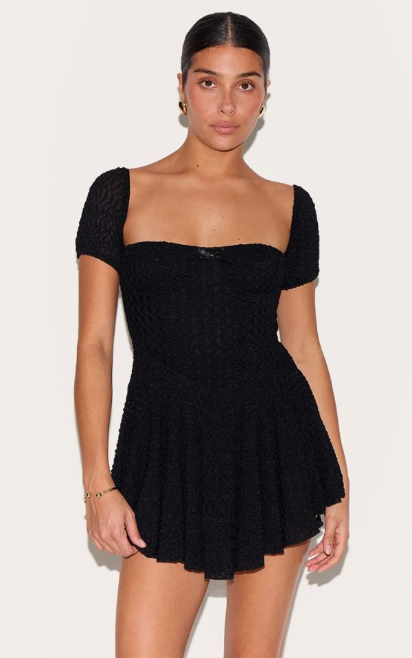 575fa656db87caf61ea15d88143114d645134715_CNM3481_1_petite_black_textured_bardot_puff_sleeve_mini_dress