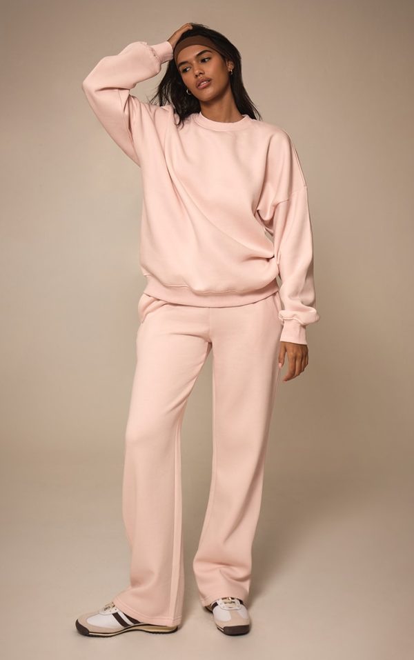 57d708f93e20271eef40f77cba42170c13bafa02_CNM8142_1_baby_pink_oversized_sweat_tracksuit_set