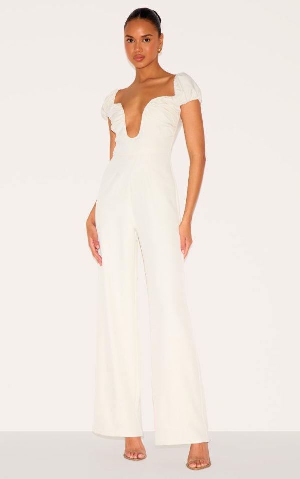 58a09ee76345dfae790c1d43e497e30e9baafd4d_CNL9261_1_cream_woven_plunge_straight_leg_jumpsuit