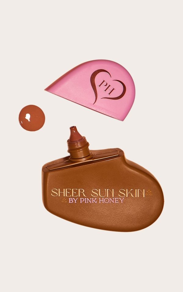 5910de75e954b551f3a7ca7a6188a726a461d2aa_CNG0636_1_pink_honey_sheer_sun_skin_sun_kissed_fluid_bronzer_dark