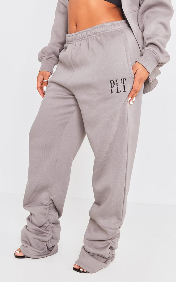 59cfbda8962ca58853a7f32840a5d16e9f95d3a8_CNG6797_2_prettylittlething_shape_charcoal_embroidered_ruched_leg_joggers