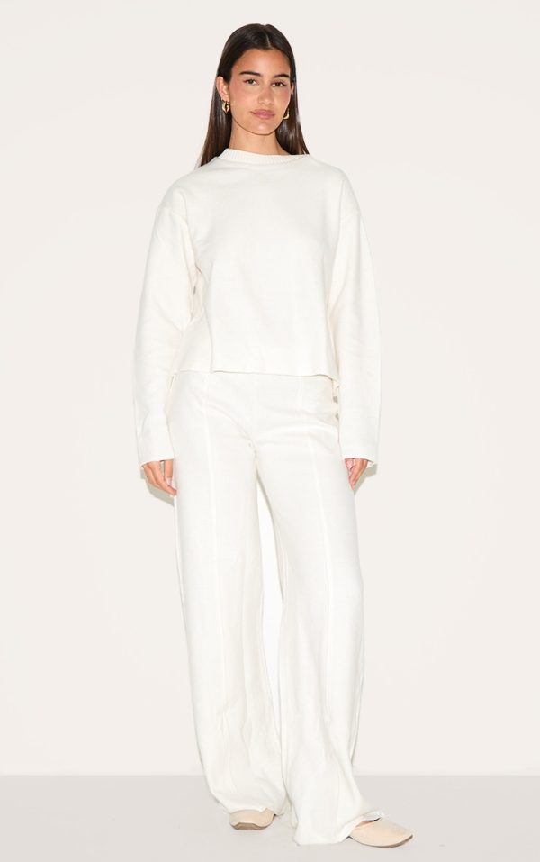 59d8a323d214e6014c4736f13a8881d091fb7b98_CNM5255_1_cream_soft_ribbed_straight_leg_trousers