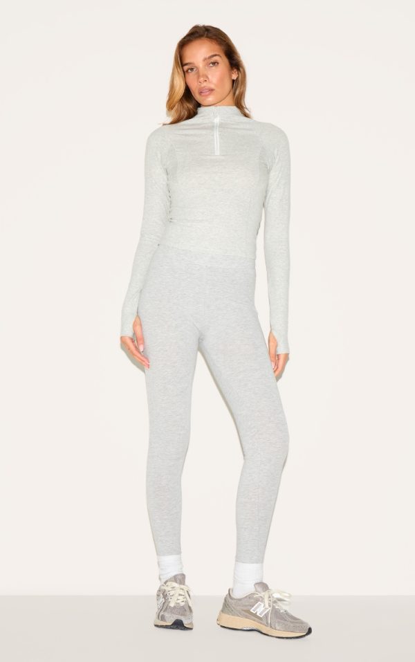 59de6e2df745c05f0bc285c4aed80487b17fc7d6_CNL6480_3_ash_grey_sculpt_quarter_zip_gym_top-1