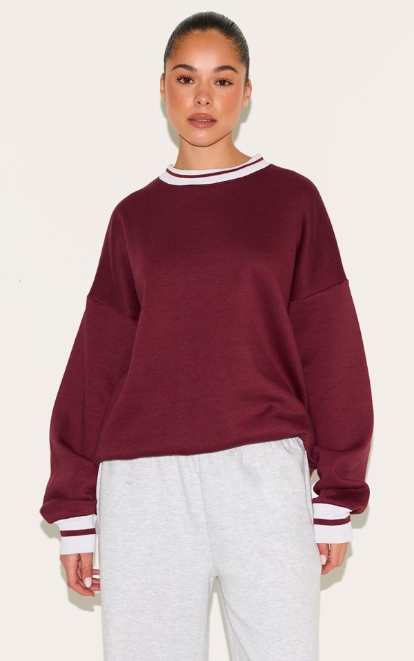 5a135edd70b217d0047d940a506de06a3a0f299d_CNL4111_1_burgundy_striped_ribbed_hem_oversized_sweatshirt-1