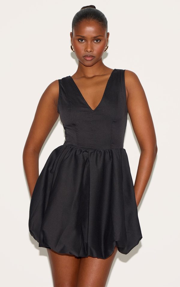 5a201cddb2ef066c21f79c00933363f88fc396e0_CNK1232_1_black_tailored_woven_v_neck_puffball_mini_dress