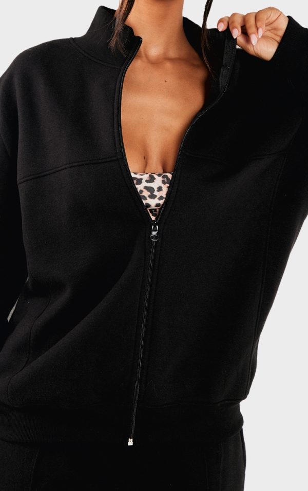 5b66ca329dcf0379efef1366b5a53b3ef024314b_CNK4386_4_petite_black_seam_detail_zip_through_track_top