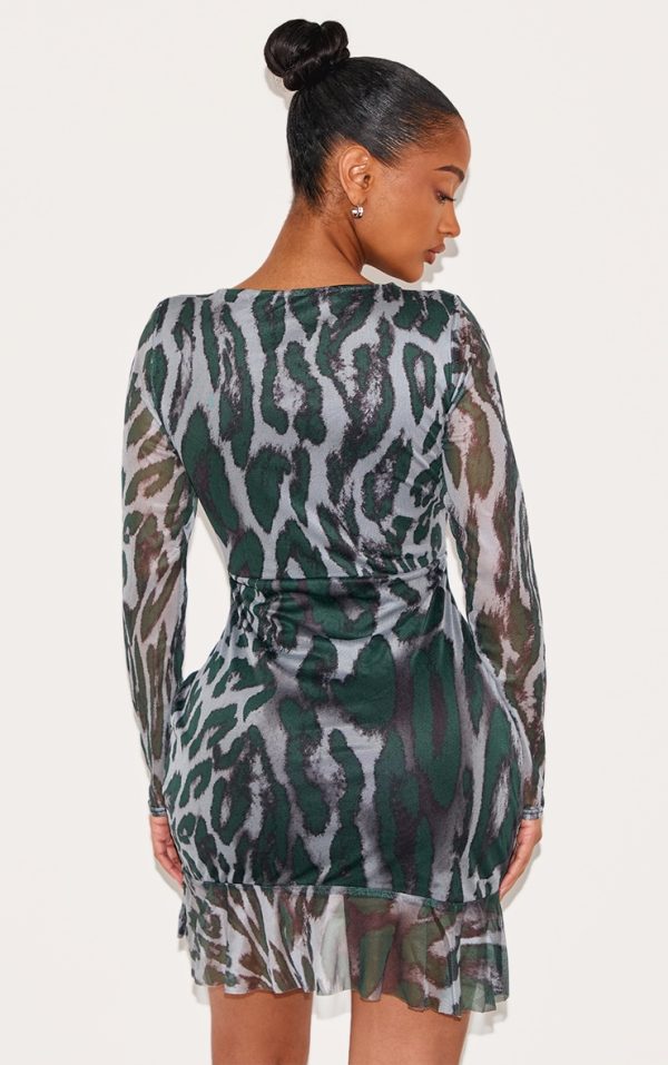 5b7cd85cd61a924f9678ca404c0cad6f483d4d82_CNC8695_2_shape_green_abstract_print_mesh_long_sleeve_ruched_side_frill_hem_bodycon_dress