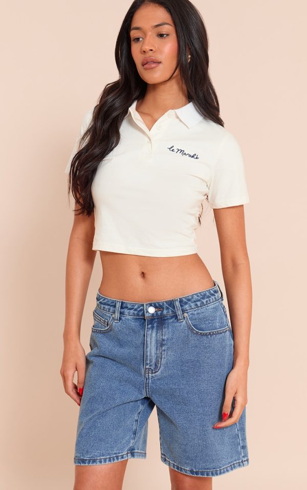 5c3facbeae8978d4dd09bb0ddccc3280b4fa67f5_CNM5558_1_tall_mid_blue_wash_mid_rise_relaxed_boyfriend_shorts