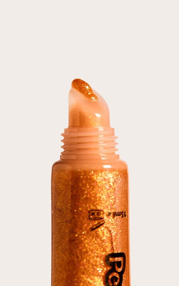5c58c34ec2516c9ae6e3a2f7c0020b54e0be5166_CNE1104_3_peaches_and_cream_supernova_lipgloss