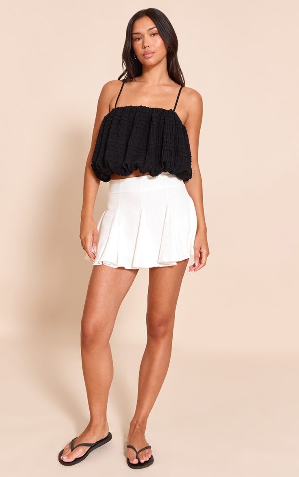 5ce901d150d73387a19f367aaf7715d89bd608db_CNM9946_4_white_linen_look_pleat_detail_mini_skirt