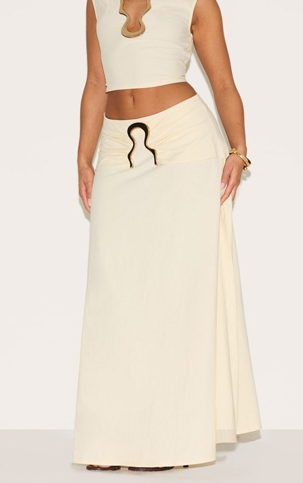 5d2c1637ab07982d3baa4782d772a64c9e4cb49a_CNM6337_2_shape_cream_linen_fold_gold_wave_trim_maxi_skirt