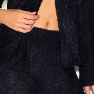 5da7b75e4a62757b5400152efd8c54569fb20e63_CNM2120_4_black_textured_wide_leg_low_rise_trousers-1
