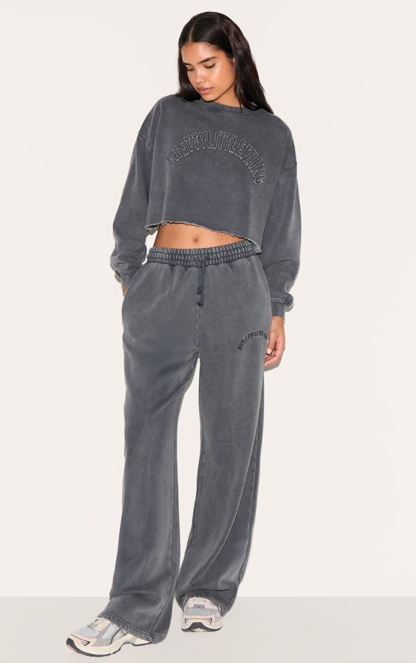 5ff03d990b1b9fde463172659ec97f179010b9e9_CNI5637_1_prettylittlething_tall_charcoal_blue_extreme_oversized_drawstring_wide_leg_joggers