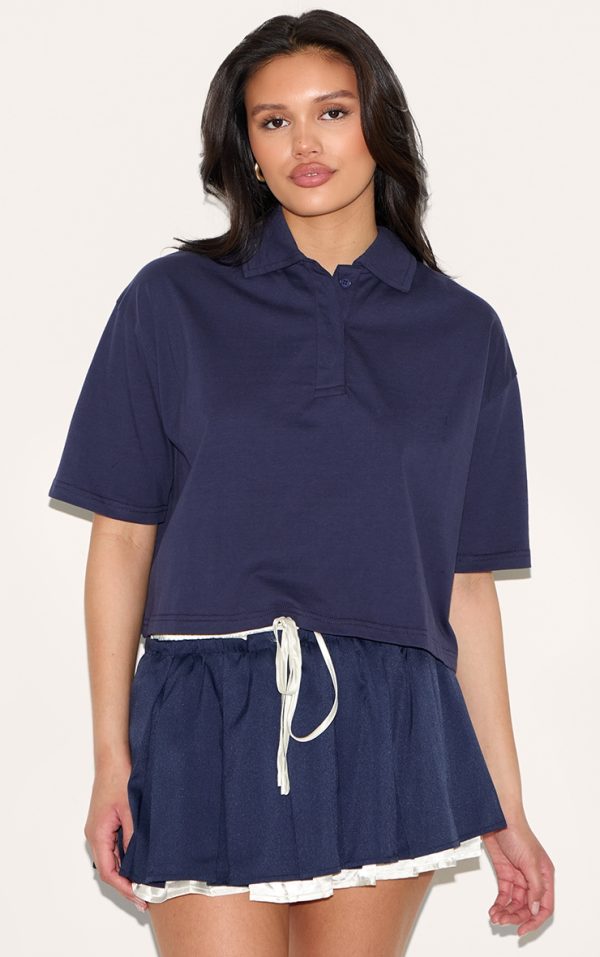 60a67f4bc65d9f56e5606d4df27b6cbe0fa92ef7_CNM6624_1_navy_oversized_short_sleeve_polo_top