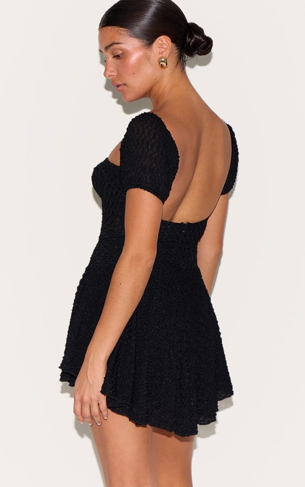 60be00231a83e5d1c836ff3f539f6567c0fc25e8_CNM3481_2_petite_black_textured_bardot_puff_sleeve_mini_dress