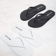 60dbe8401ddec7ea20ee0aca5506c4e8613f9bf2_CLV1491_1_black_and_white_flip_flops_2_pack