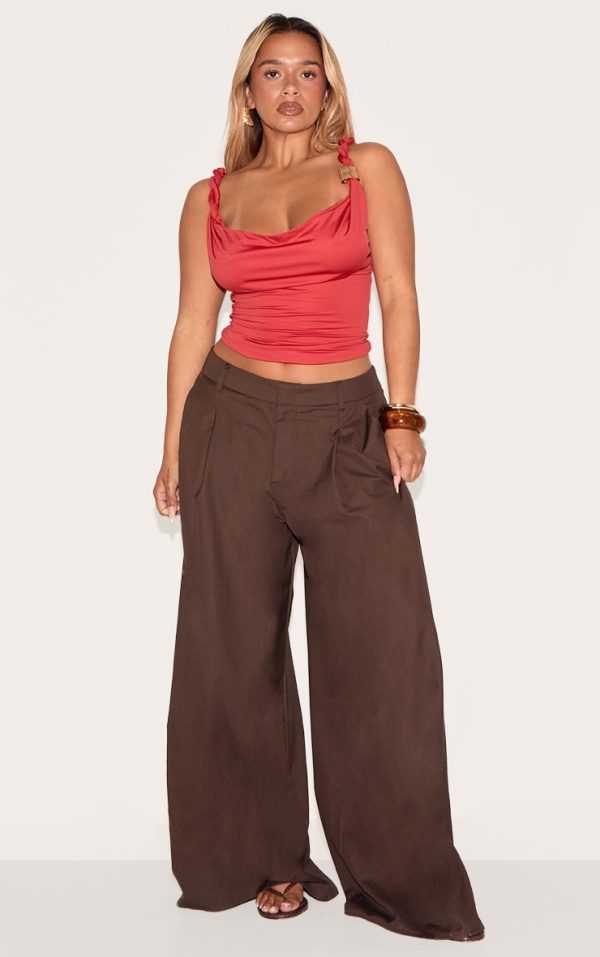 61060ff9e051879dc90101d0ab8b5696f9d03040_CNM7281_3_shape_red_cowl_neck_twisted_gold_trim_strap_top