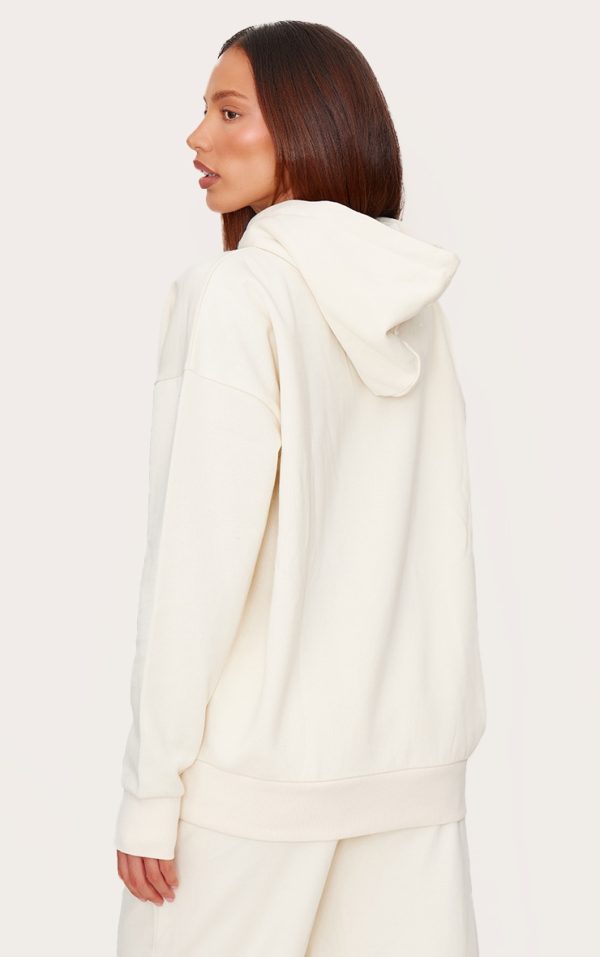61b8a85996f32607880d235249387cdbf32ffbcb_CNL1168_2_prettylittlething_cream_premium_embossed_oversized_hoodie