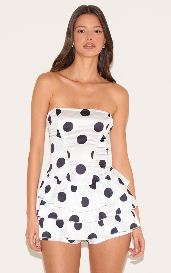 62492e672e547a30305a6777f6154055d5c61254_CNM0418_1_cream_polka_dot_rara_skort_woven_playsuit