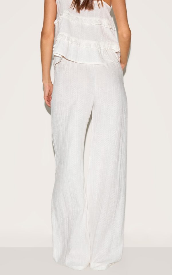 626eb35293b600b6b925e83f174f6174a55182b0_CNM3210_3_white_textured_mid_rise_wide_leg_trousers
