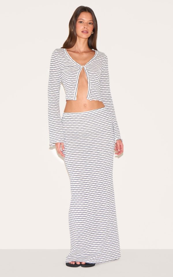 62a8bd7698e749c7f8d139132a6fa11fdb23828b_CNM7410_1_navy_textured_striped_mid_rise_maxi_skirt
