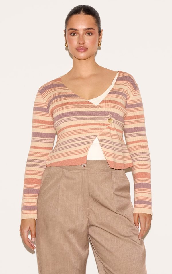 62f38f5622784d47e566daa30586b4a8778ebb2e_CNM8081_4_shape_peach_knitted_strippred_wrap_over_gold_button_cardigan