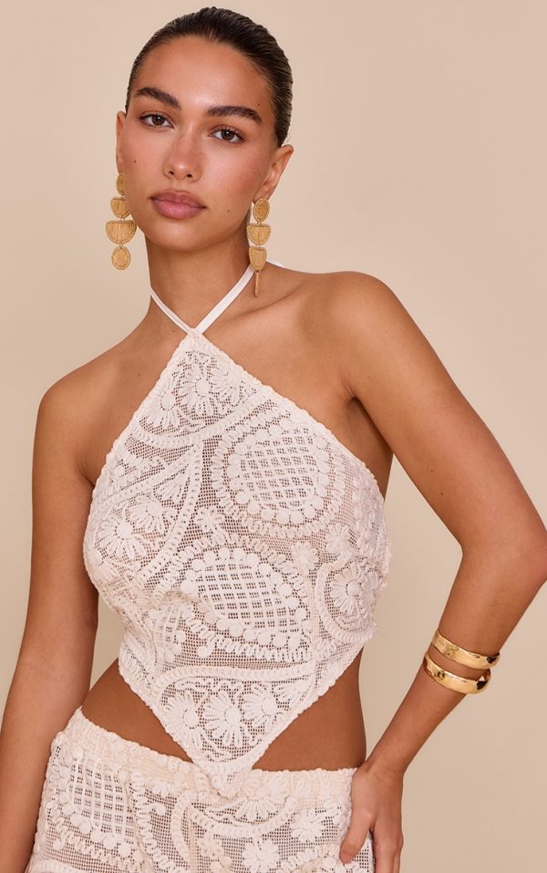 630395912dd61b8b720eb0f7fabbfbf7fa8b8ad9_CNM8767_1_cream_textured_embroidered_halterneck_tie_back_top