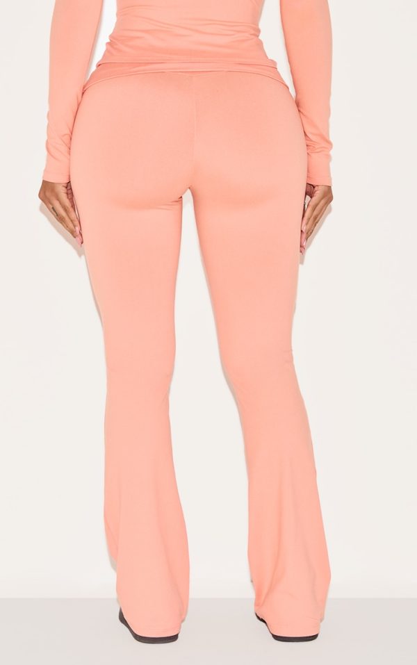 634f7a0fdef4cfa28d2075a387cfe816da90b94b_CNM1099_3_shape_peach_sculpted_foldover_waist_flare_trousers