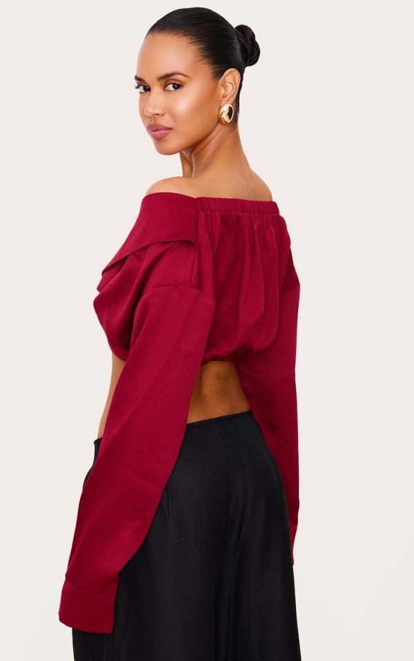 641571582884430f8f1aab4cfc90e912ddc88cfb_CNL6015_2_burgundy_satin_bardot_twist_front_crop_blouse