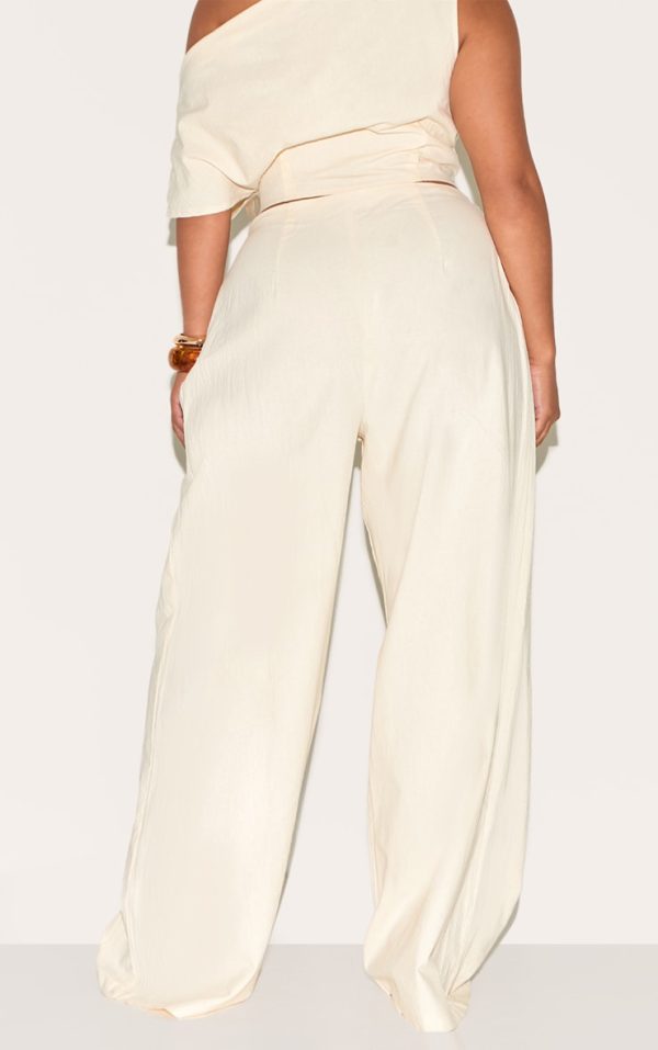 64bd2fcec3787c38535e5f9bb9d5b59d1afcd36e_CNM6341_3_shape_cream_linen_highwaisted_pleated_wide_leg_trousers