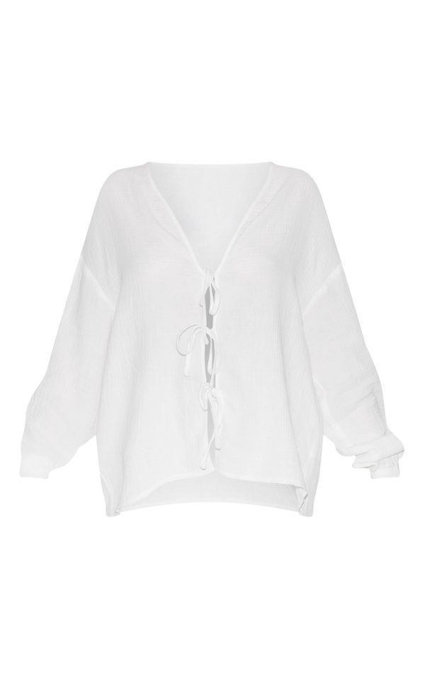 65cf8d4b8e2cadb8684be099cd988d04edf54f70_CNM3962_5_petite_white_cheesecloth_textured_tie_front_shirt