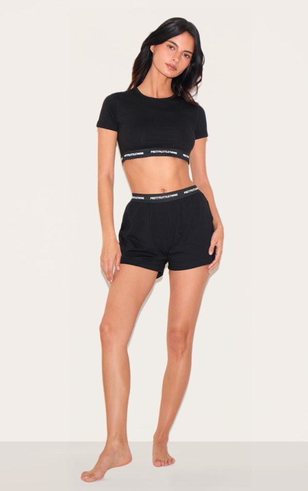 67775b51b87cad60ea8b283fddcb4ef5479ae16b_CNK2315_3_prettylittlething_black_tape_short_sleeve_pj_top-1
