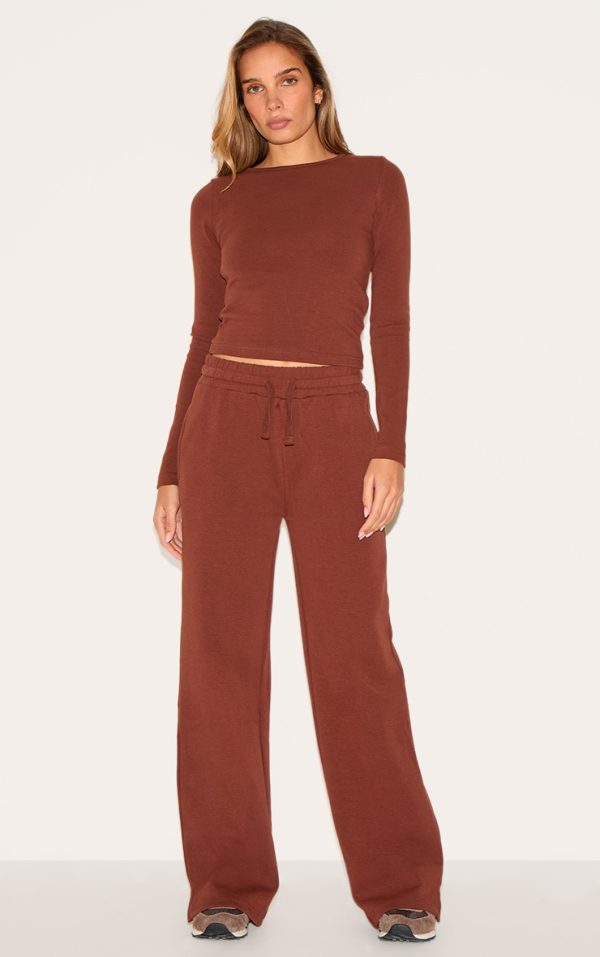 6784e5f3860c7870c06c0df2d9e6e14943ad53cf_CNL8060_1_chocolate_interlock_wide_leg_split_hem_joggers-1