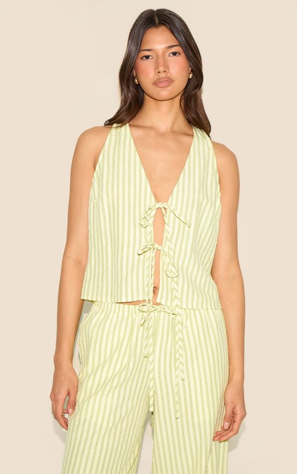 67af1f6aa54f6d43e6955836f1542ce8f9845543_CNM1750_1_lime_green_striped_sleeveless_tie_front_top