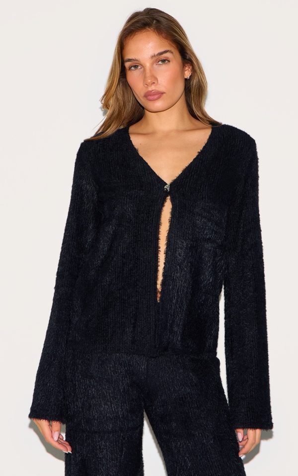 6855d9f395adef3256110c5efe2a5d6882603fe4_CNM2121_1_black_textured_v_neck_button_cardigan-1
