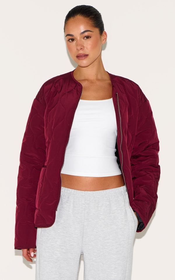 6874da217023f7c67351feb6fb2041d9b21bb710_CNM1419_1_plum_zip_up_quilted_jacket-1