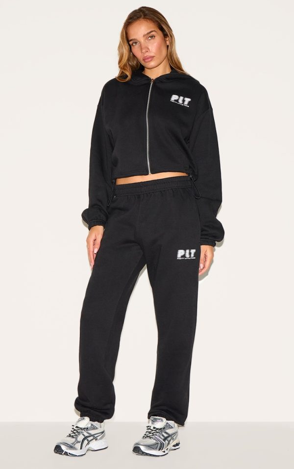 68cd2a7ed84112f9dfdcb91dac1f7682fcc52b4f_CNK1542_1_prettylittlething_black_oversized_cuffed_joggers