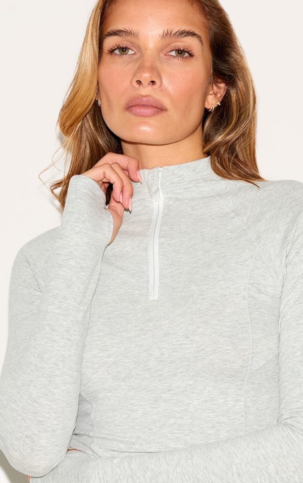 692ed98a44bdc8f19b66bd78bea5129954a6912f_CNL6480_4_ash_grey_sculpt_quarter_zip_gym_top-1