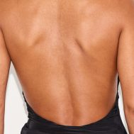 69c65cb6c4cd74582c3d03b3384ec467e2d3d472_CNK8932_4_shape_black_halter_cowl_neck_long_line_open_back_top