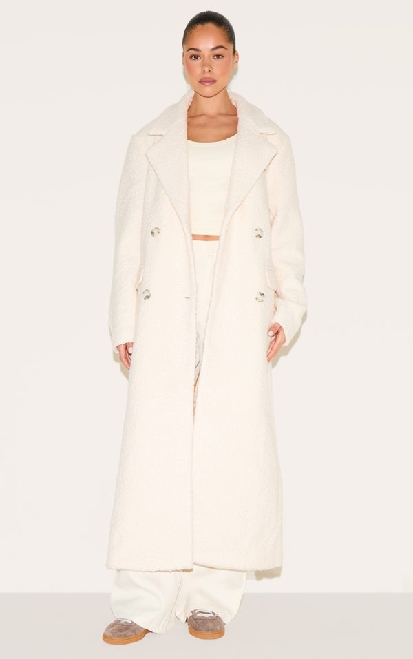 6a944f1e868b8c269e9d8d6a17b754f579765d0e_CNJ9059_1_ecru_boucle_double_breasted_structured_maxi_coat