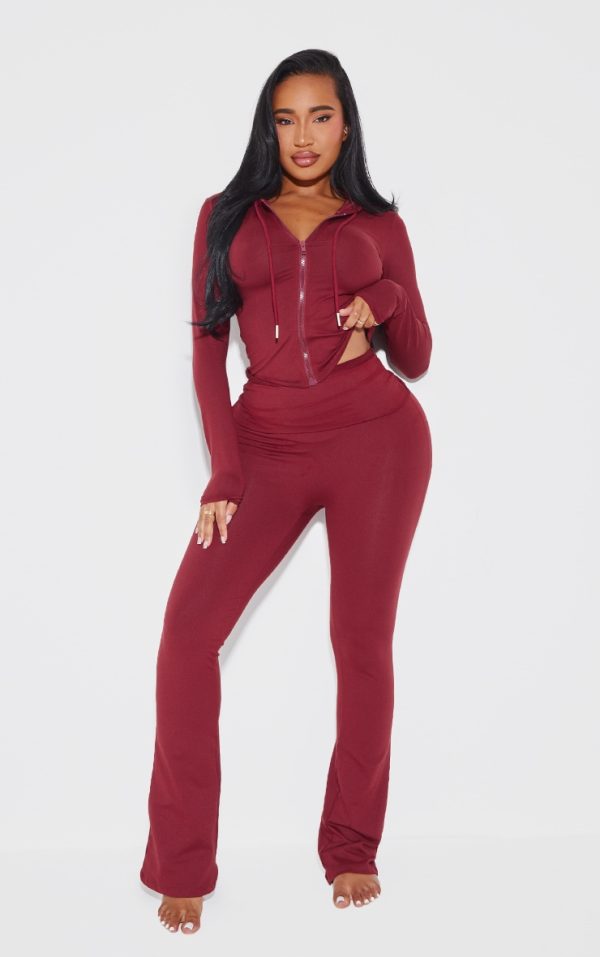 6a962aa6d4daaacf8c79364c459ad98b3c2df925_CNK0782_1_shape_burgundy_sculpted_foldover_waist_flare_trousers
