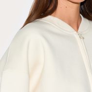 6c5cb58577fafd2d00b3f0da76ba455a3b00f730_CNM7125_4_cream_drawcord_waist_cropped_zip_up_sweatshirt